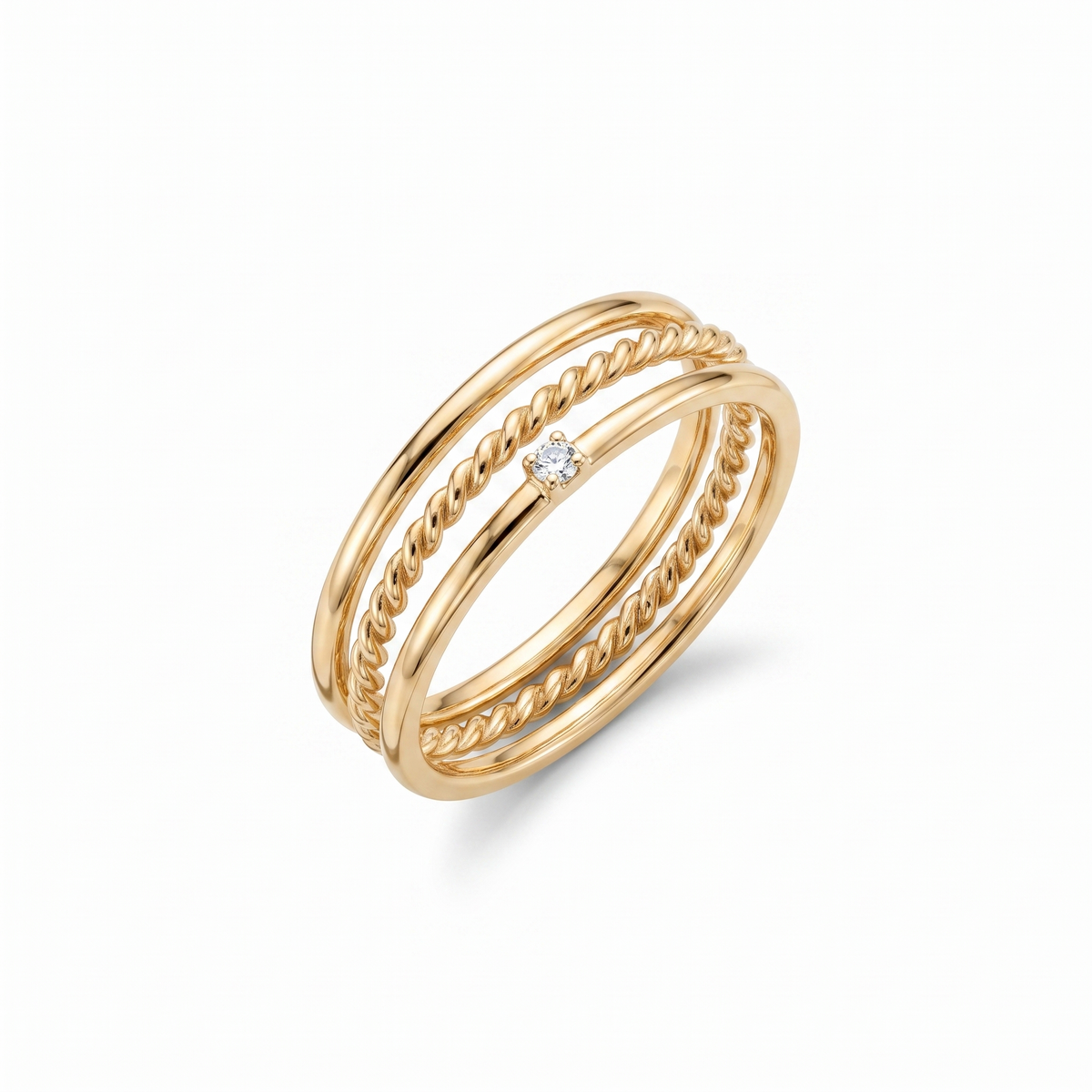 Set de 3 anillos lisos para apilar bañados en oro de 18K vistos desde arriba