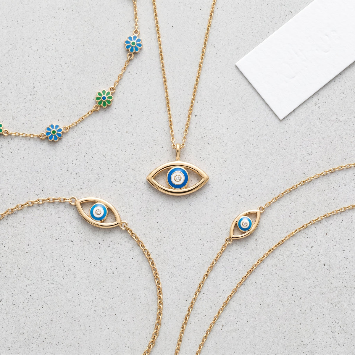 Collar amuleto ojo turco bañado en oro de 18K combinado con otras joyas UpperEast