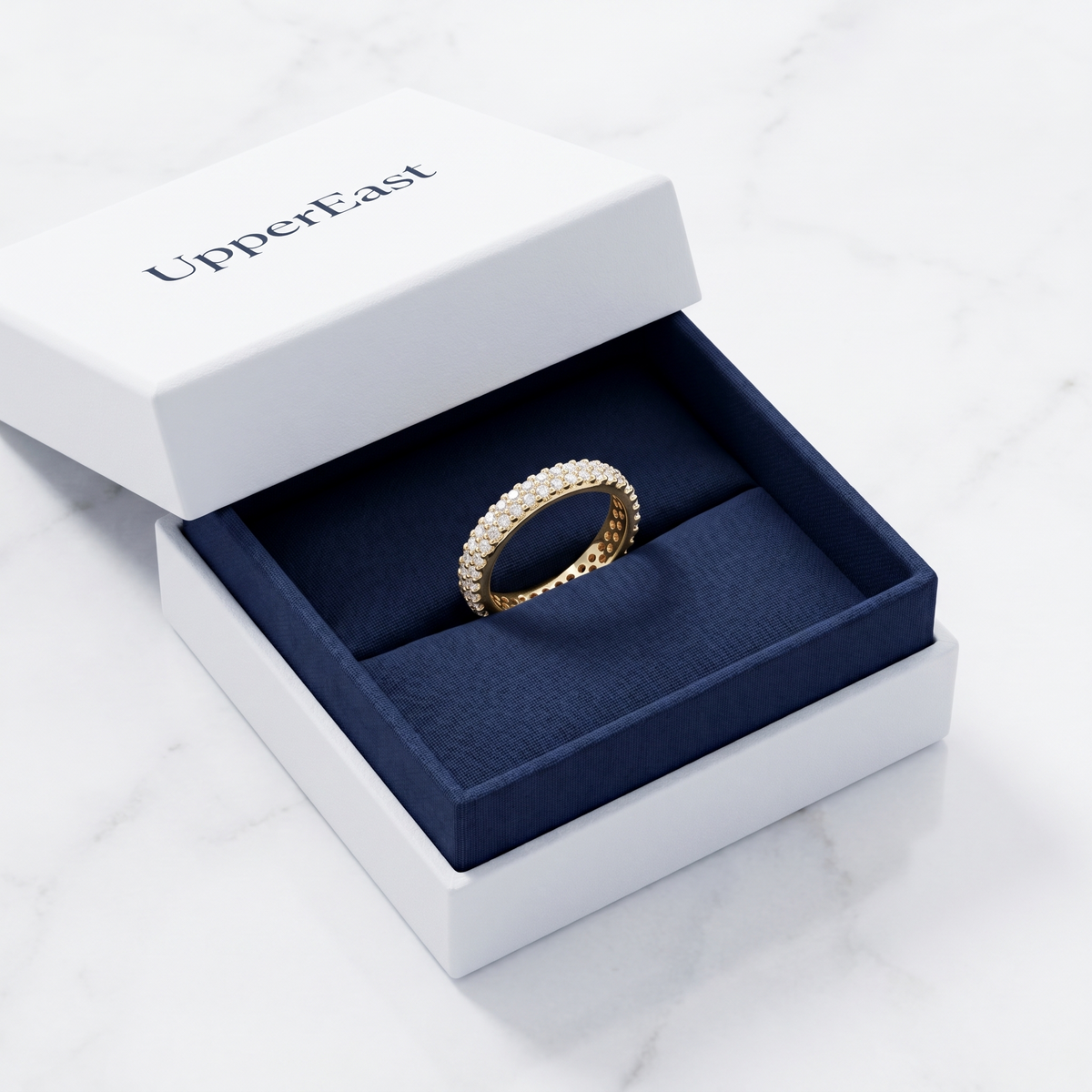 Anello sottile midi twist placcato oro 18K nella confezione UpperEast
