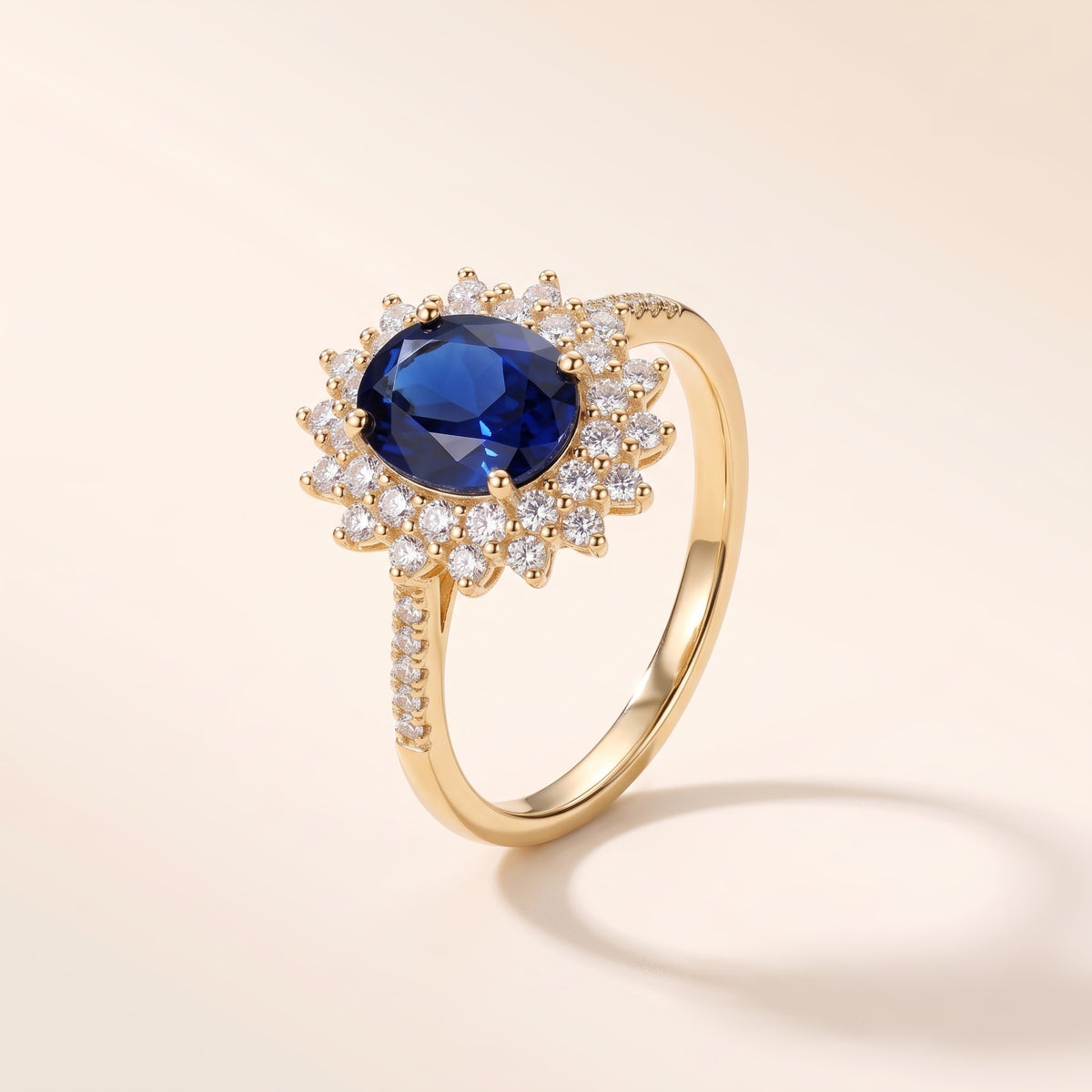 Anello con pietra blu e zirconi placcato oro 18K