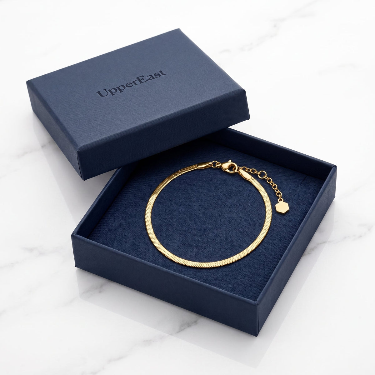 Bracciale catena snake piatta placcato oro 18K nella confezione UpperEast