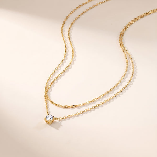 Collana layered punto luce placcata oro 18K