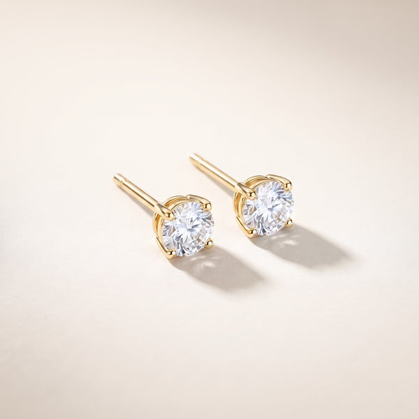Orecchini punto luce zircone placcati oro 18K